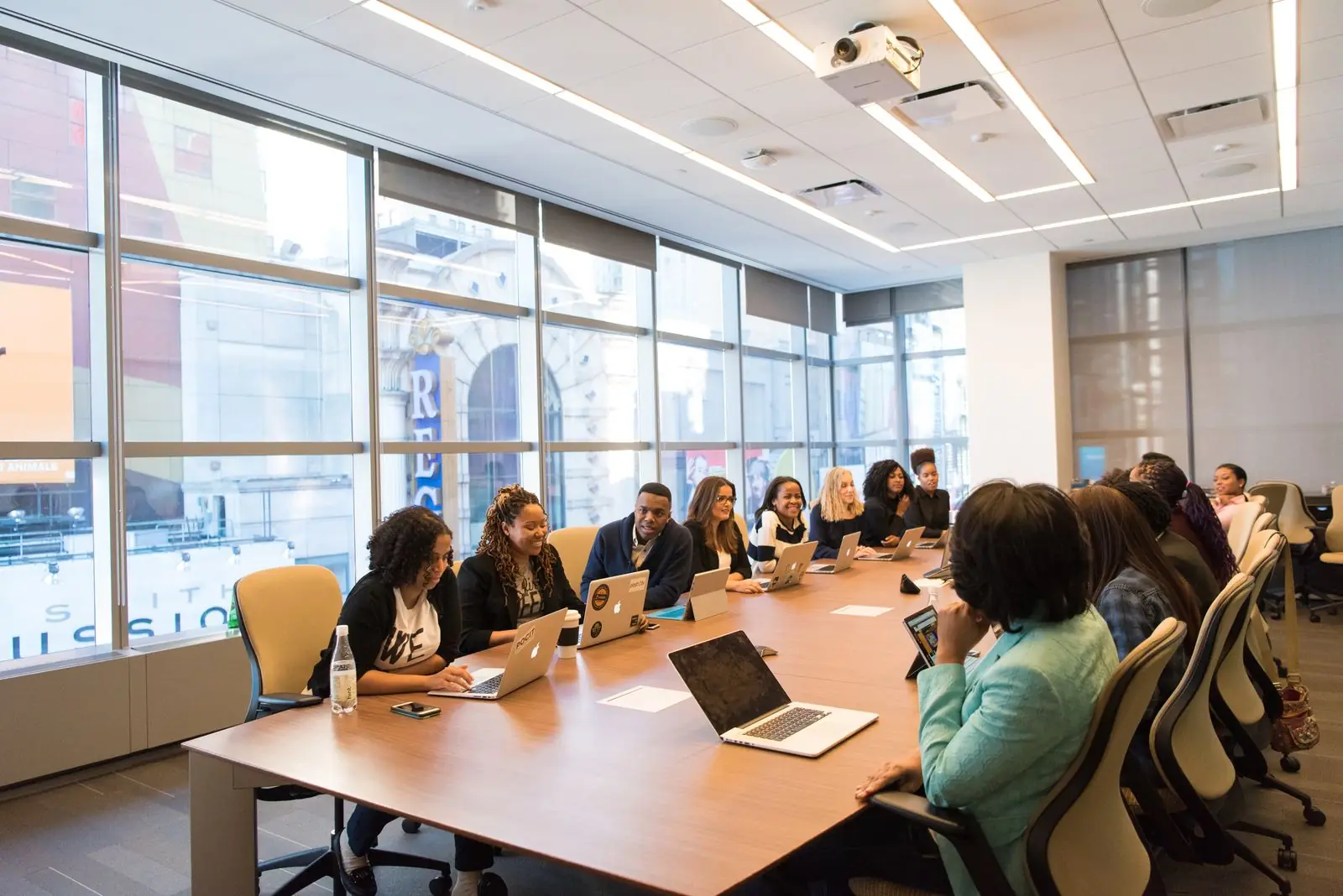 Underwriting team in a large meeting room